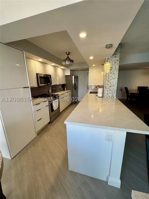 100 Golden Isles Dr #205, Hallandale Beach, FL 33009