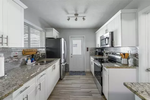 Kitchen - 1101 E River Dr, Margate, FL 33063 photo 2 of 2