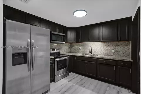 Kitchen - 550 E 10th Ave, Hialeah, FL 33010 photo 1 of 3