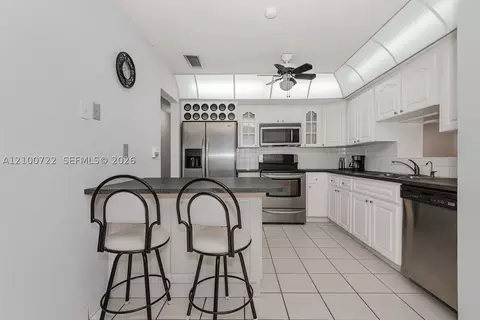 Kitchen - 7802 W 18th Ln, Hialeah, FL 33014 photo 2 of 3
