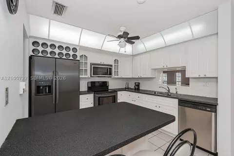 Kitchen - 7802 W 18th Ln, Hialeah, FL 33014 photo 3 of 3