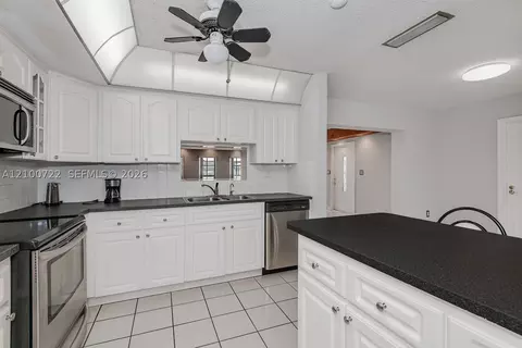 Kitchen - 7802 W 18th Ln, Hialeah, FL 33014 photo 1 of 3