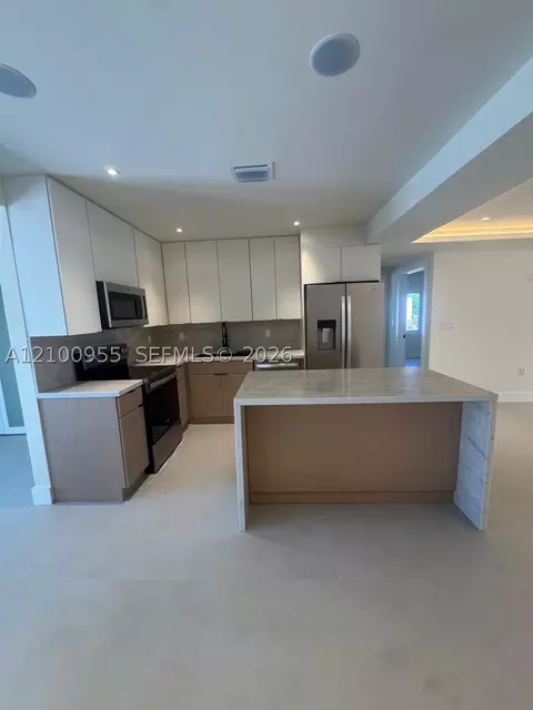 Kitchen - 841 NE 4th Pl, Hialeah, FL 33010 photo 2 of 3