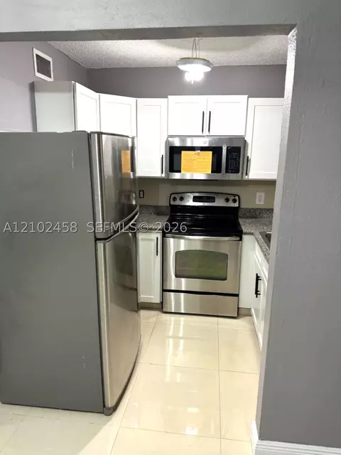 Kitchen - 5461 W 24th Ave #25, Hialeah, FL 33016 photo 2 of 2