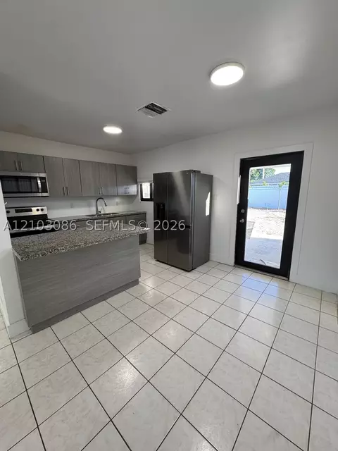Kitchen - 850 SE 2nd Pl, Hialeah, FL 33010 photo 3 of 3