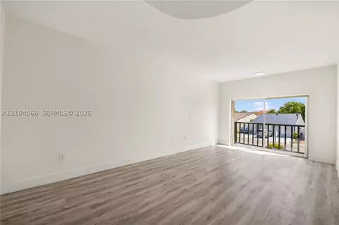 Living - 3860 W 10th Ct, Hialeah, FL 33012 photo 6 of 7