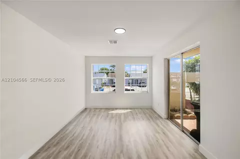 Living - 3860 W 10th Ct, Hialeah, FL 33012 photo 5 of 7