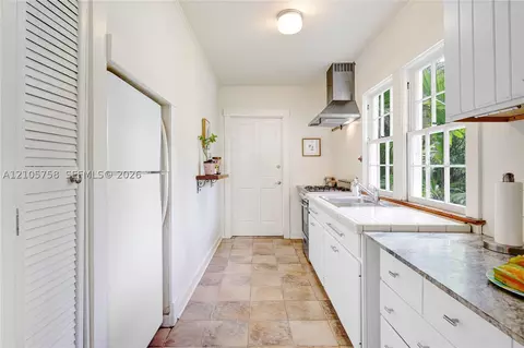 Kitchen - 668 NE 70th St, Miami, FL 33138 photo 1 of 4
