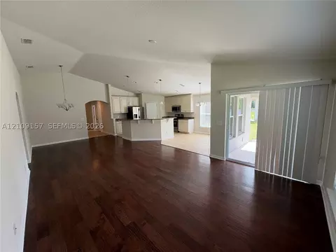 Living - 10930 Inside Loop, Orlando, FL 32825 photo 2 of 2