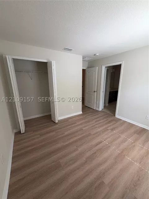 Bedroom - 10930 Inside Loop, Orlando, FL 32825 photo 5 of 7