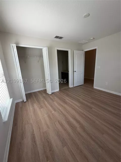 Bedroom - 10930 Inside Loop, Orlando, FL 32825 photo 4 of 7