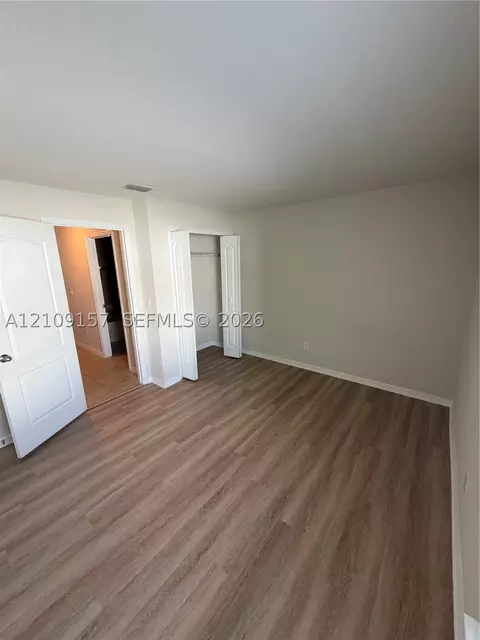 Bedroom - 10930 Inside Loop, Orlando, FL 32825 photo 7 of 7