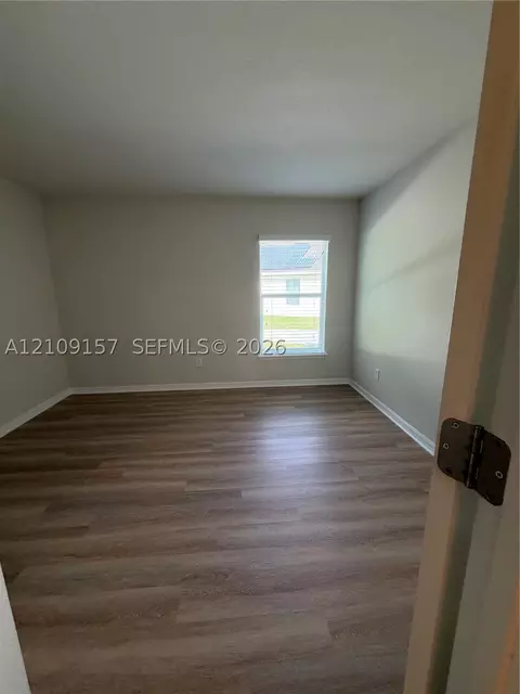 Bedroom - 10930 Inside Loop, Orlando, FL 32825 photo 6 of 7
