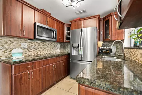 Kitchen - 419 SE 3rd St, Hialeah, FL 33010 photo 3 of 3