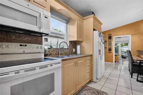 Kitchen - 2427 W 70th Pl, Hialeah, FL 33016 photo 1 of 1