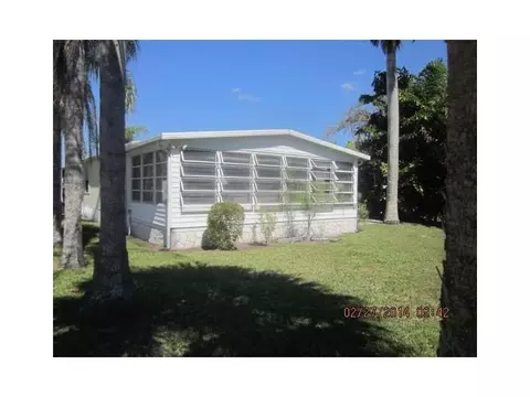 7911 SE Paradise Dr, Stuart, FL 34997 photo 1
