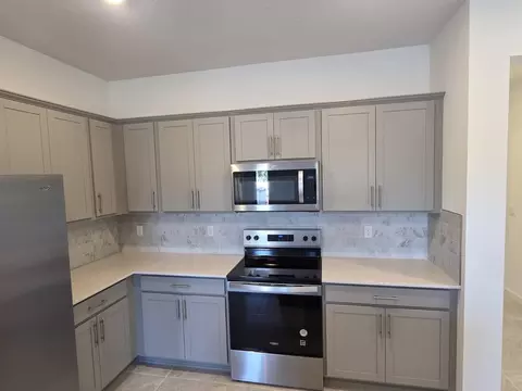Kitchen - 7783 SW Bentley Ln, Stuart, FL 34997 photo 3 of 4
