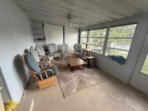 Exterior - 7733 SE Fork River Dr, Stuart, FL 34997 photo 2 of 3