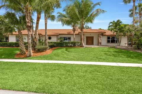 21 Whispering Oaks Cir, West Palm Beach, FL 33411
