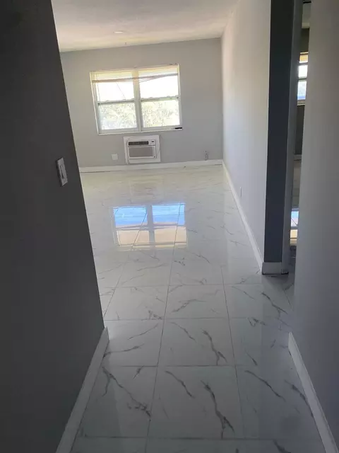 1150 E Sample Rd #302, Pompano Beach, FL 33064 photo 2