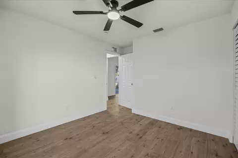 Bedroom - 945 SE Forrest Park Dr, Stuart, FL 34994 photo 1 of 7
