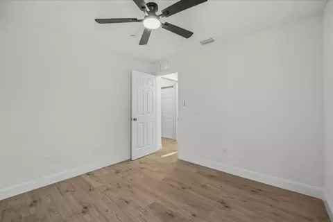 Bedroom - 945 SE Forrest Park Dr, Stuart, FL 34994 photo 7 of 7