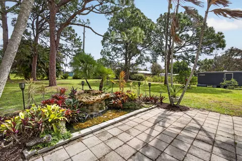 Exterior - 5589 SE Paramount Dr, Stuart, FL 34997 photo 10 of 16