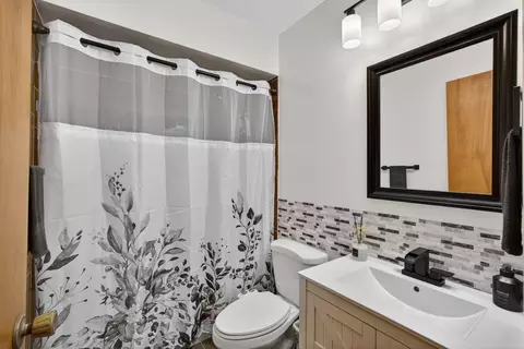 Bath - 5589 SE Paramount Dr, Stuart, FL 34997 photo 2 of 2