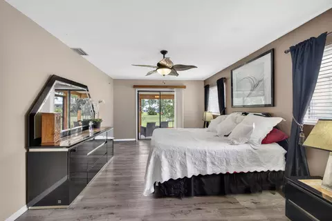 Bedroom - 5589 SE Paramount Dr, Stuart, FL 34997 photo 2 of 6