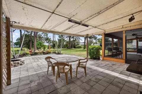 Exterior - 5589 SE Paramount Dr, Stuart, FL 34997 photo 7 of 16