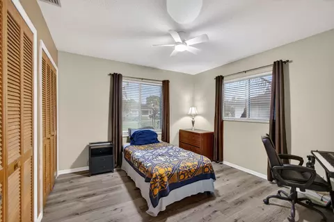 Bedroom - 5589 SE Paramount Dr, Stuart, FL 34997 photo 5 of 6