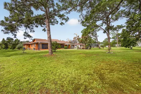 Exterior - 5589 SE Paramount Dr, Stuart, FL 34997 photo 14 of 16