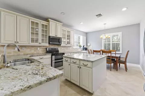 Kitchen - 1428 SE Summit Trl, Stuart, FL 34997 photo 2 of 3