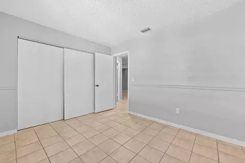 Bedroom - 4548 SE Salvatori Rd, Stuart, FL 34997 photo 5 of 5