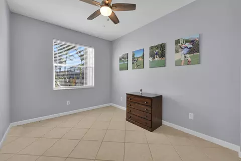 Bedroom - 7041 SE Bay Hill Dr, Stuart, FL 34997 photo 6 of 10
