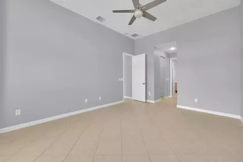 Bedroom - 7041 SE Bay Hill Dr, Stuart, FL 34997 photo 3 of 10