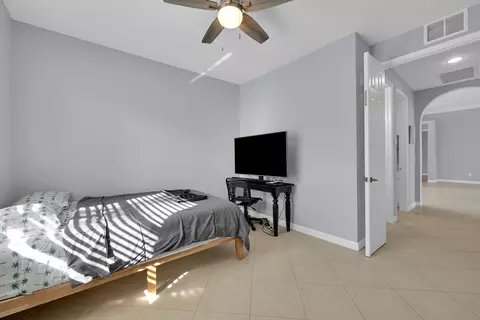 Bedroom - 7041 SE Bay Hill Dr, Stuart, FL 34997 photo 4 of 10