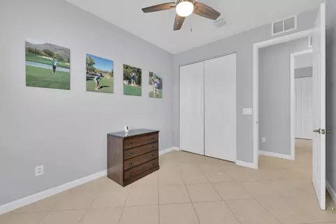 Bedroom - 7041 SE Bay Hill Dr, Stuart, FL 34997 photo 7 of 10