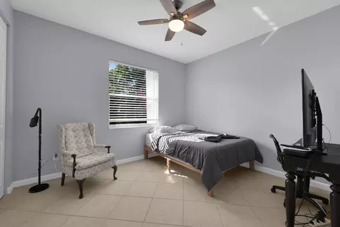 Bedroom - 7041 SE Bay Hill Dr, Stuart, FL 34997 photo 5 of 10