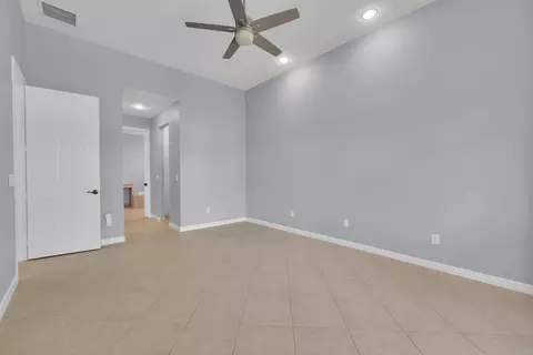 Bedroom - 7041 SE Bay Hill Dr, Stuart, FL 34997 photo 2 of 10