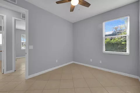 Bedroom - 7041 SE Bay Hill Dr, Stuart, FL 34997 photo 10 of 10