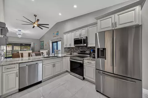 Kitchen - 1036 E Lakes Dr, Pompano Beach, FL 33064 photo 1 of 5