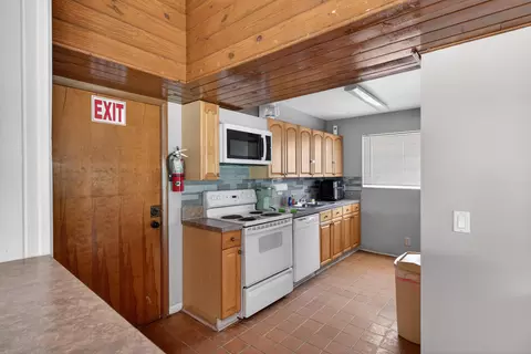 Kitchen - 1036 E Lakes Dr, Pompano Beach, FL 33064 photo 5 of 5
