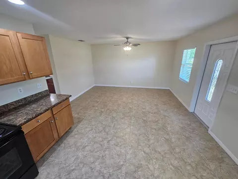 Living - 1749 NE 2nd St, Okeechobee, FL 34972 photo 1 of 1