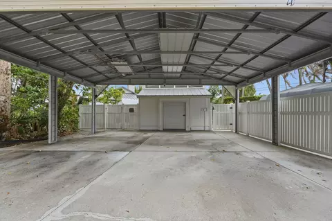 Exterior - 576 SW Rustic Cir, Stuart, FL 34997 photo 8 of 14