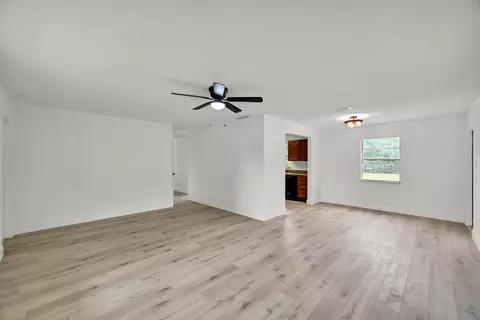 Living - 833 NW 34th St, Okeechobee, FL 34972 photo 2 of 4