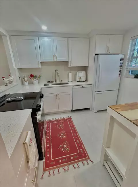 Kitchen - 3060 Holiday Springs Blvd #102, Margate, FL 33063 photo 3 of 3