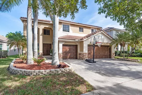 609 Honeysuckle Ln, Weston, FL 33327