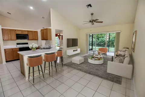 3572 Sanctuary Dr, Coral Springs, FL 33065 photo 2