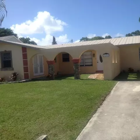 3191 SE Hibiscus St, Stuart, FL 34997 photo 1